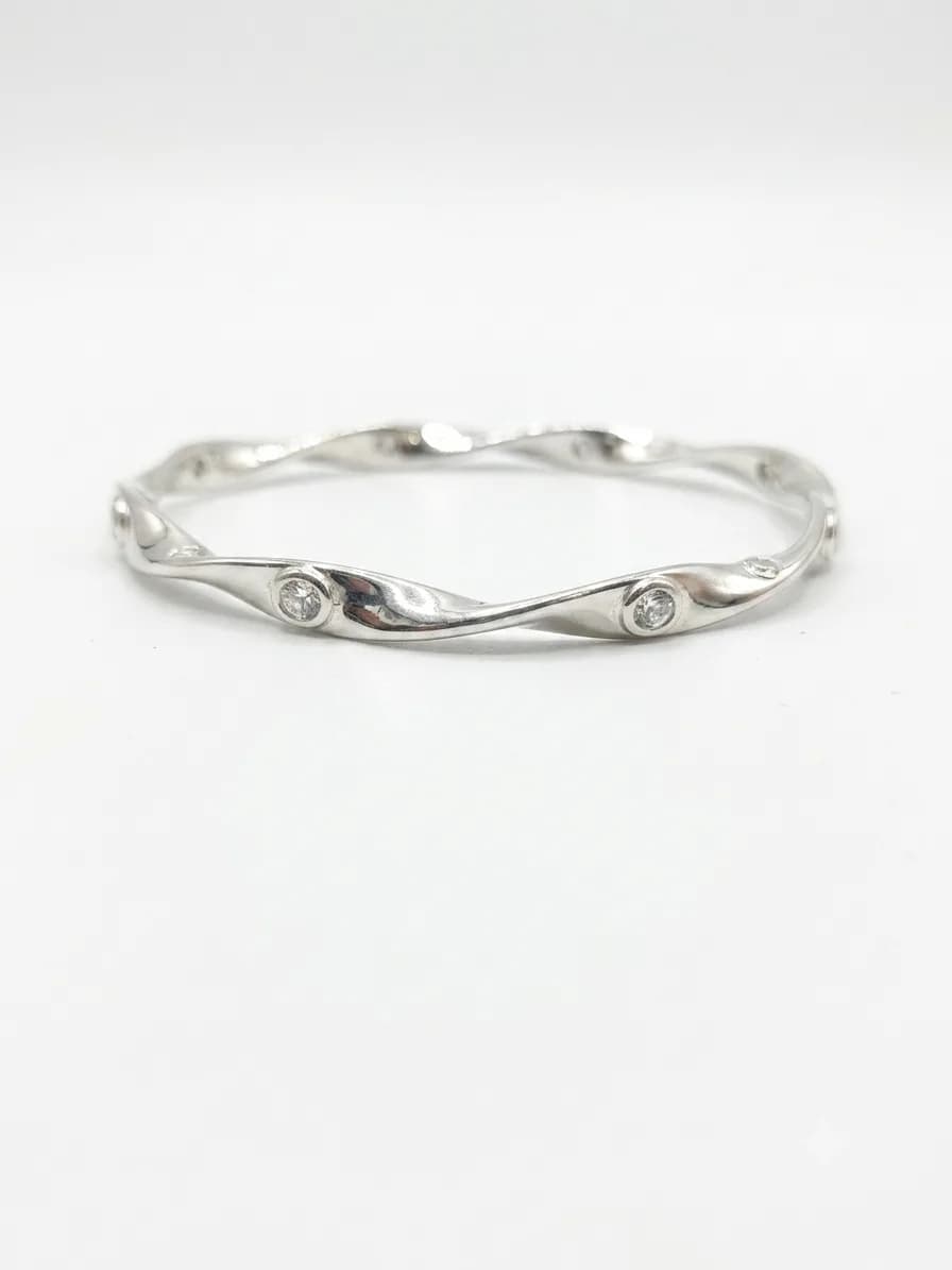 Twisted Silver Bangle